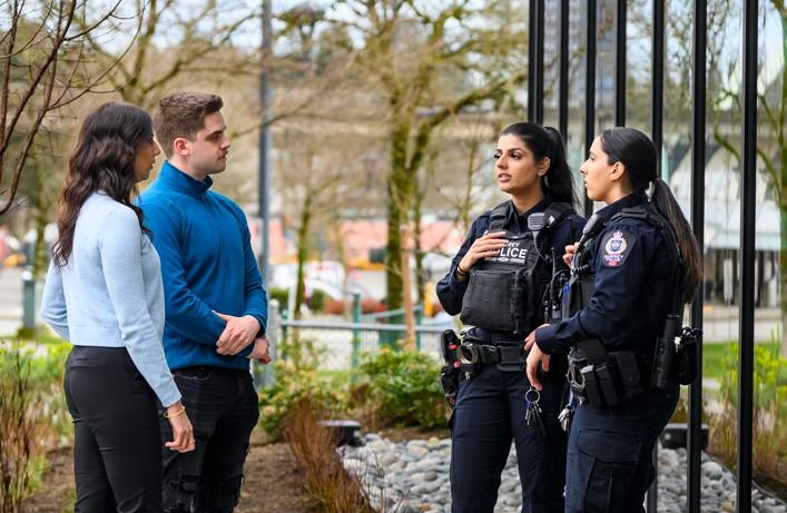 Officers talking with civilians