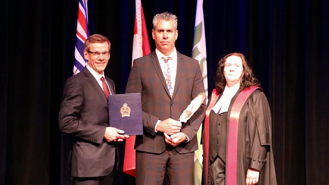 Deputy Chief Constable Michael LeSage onstage with Chief Lipinski and Honourable Judge Kimberley Arthur-Leung