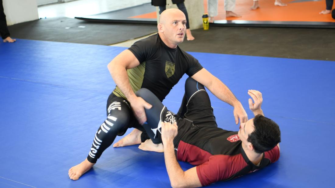 Instructor on mat 