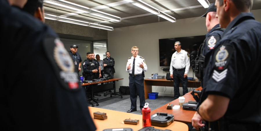 Chief Lipinski speaks in front of deployed members 