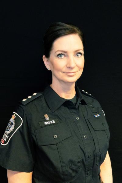 Insp. Milne standing in uniform 